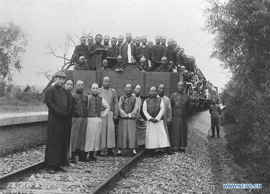 <?php echo strip_tags(addslashes(File photo taken in 1909 shows Zhan Tianyou (3rd R, Front) poses for a group photo with his colleagues for the completion of the Beijing-Zhangjiakou Railway. Zhan presided over the construction of the railway line, the first one designed and built by Chinese. (Xinhua))) ?>