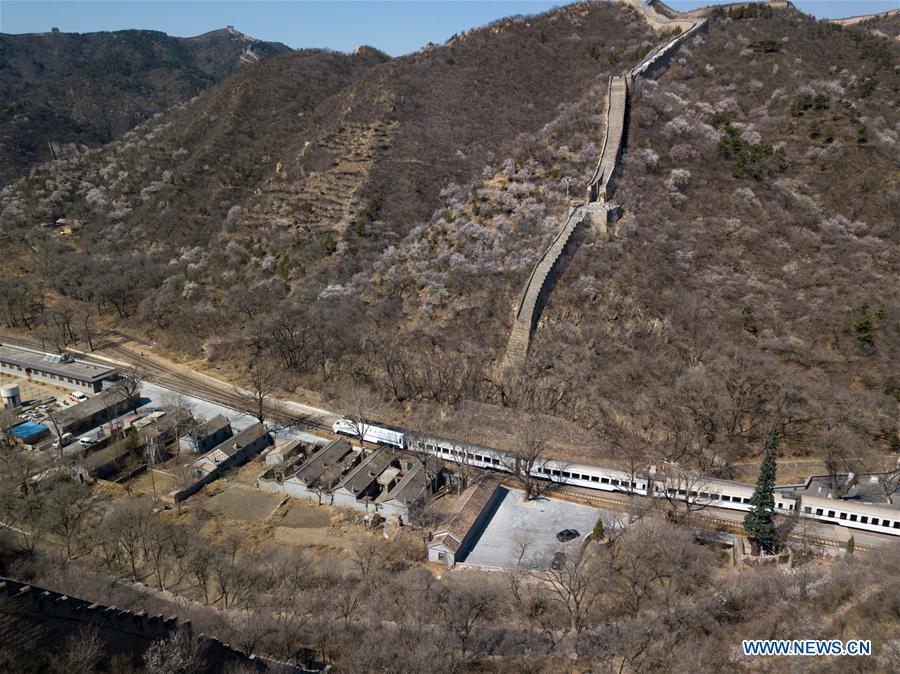 <?php echo strip_tags(addslashes(In this aerial photo taken on April 2, 2019, a Line S2 train of Beijing Suburban Railway (BSR) pulls out of Qinglongqiao station of the Beijing-Zhangjiakou railway in Beijing, capital of China. (Xinhua/Ju Huanzong))) ?>