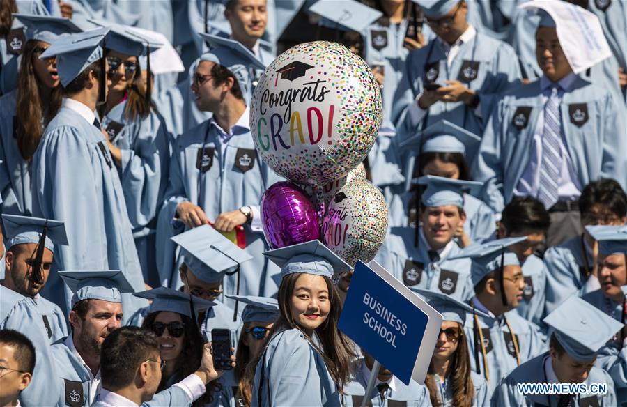 Graduate students attend the Columbia University Commencement ceremony in New York, the United States, May 22, 2019. The Columbia University Commencement ceremony of the 265th academic year took place on Wednesday. More than 17,000 students from Columbia\'s 18 schools and affiliates graduated this year. (Xinhua/Wang Ying)