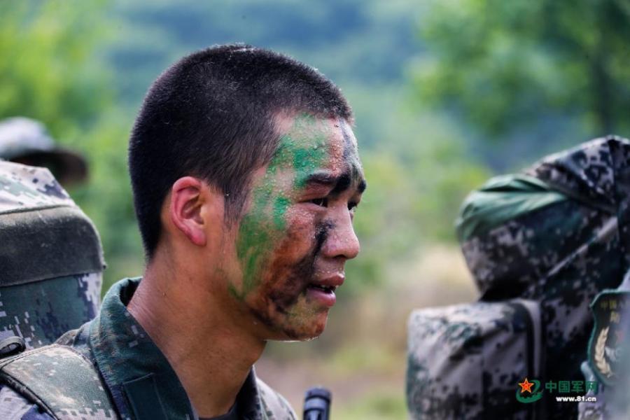 <?php echo strip_tags(addslashes(Army scouts undergo an intensive training at a military base in Easter Anhui Province. Soldiers needed to carry a load no less than 30 kilograms marching over a distance of 100 kilometres amid tens of other training programs. (Photo/81.cn))) ?>