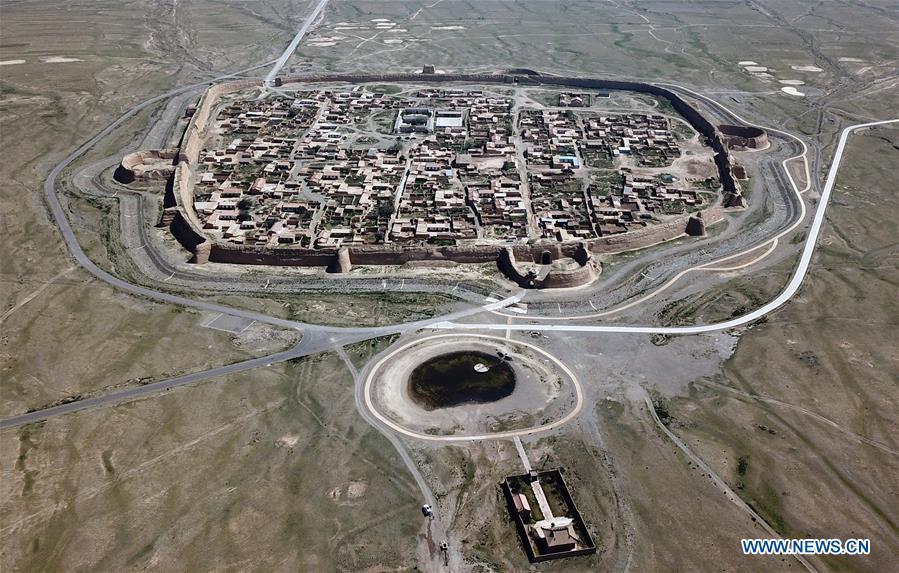 <?php echo strip_tags(addslashes(Aerial photo taken on May 28, 2019 shows a view of the Yongtai ancient city in Jingtai County of Baiyin, northwest China's Gansu Province. Construction of the Yongtai ancient city began in the early 17th century and the complex used to be a military fortress. Girdled by 12-meter wall structures totaling 1.7 kilometers in length, the Yongtai ancient city looks like a turtle when seen from above and is thus dubbed 