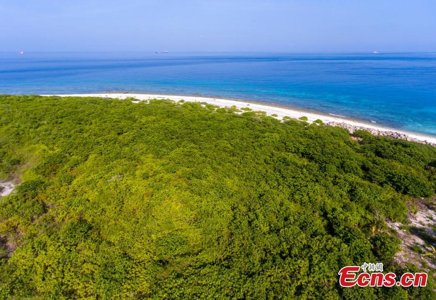 <?php echo strip_tags(addslashes(A view of Ganquan Island in the Xisha Yongle Islands group in South China's Hainan Province, May 22, 2019. Named after a freshwater well, the lush, oval-shaped island covers an area of 0.3 square kilometers. The remains of a settlement dating back to the Tang and Song dynasties was found there in March 1974, and the site was later listed as a national key cultural relics site. (Photo: China News Service/Luo Yunfei))) ?>