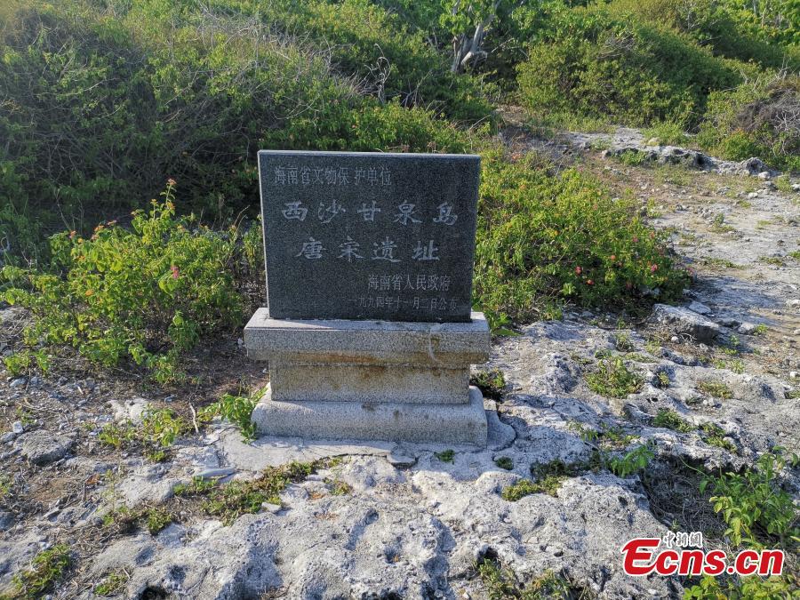 A stone tablet marks the remains of a settlement dating back to the Tang and Song dynasties on Ganquan Island in South China\'s Hainan Province, May 22, 2019. (Photo: China News Service/Yang Xu)