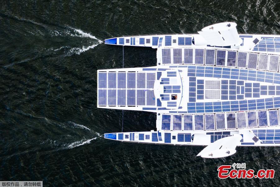 <?php echo strip_tags(addslashes(An aerial picture taken on May 28, 2019 shows the self-energy producing multihull 