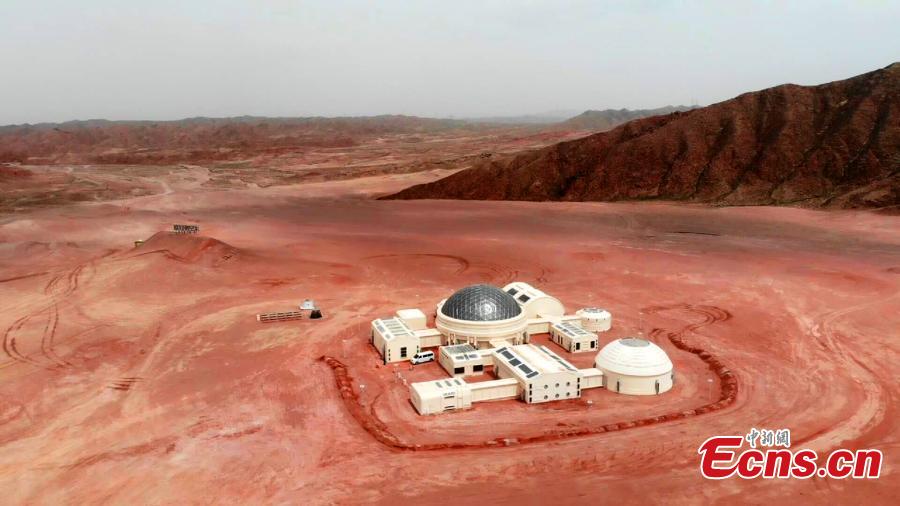 Photo taken on May 29, 2019 shows a Mars simulation base in the barren, windswept hills of Jinchang City, Northwest China’s Gansu Province. Planned to cover 67 square kilometers, Mars Base 1 Camp will include nine modules including a greenhouse and a mock decompression chamber. Authorities hope the camp will boost tourism and allow visitors to feel as though they are on the Red Planet.  (Photo: China News Service/Li Yalong)