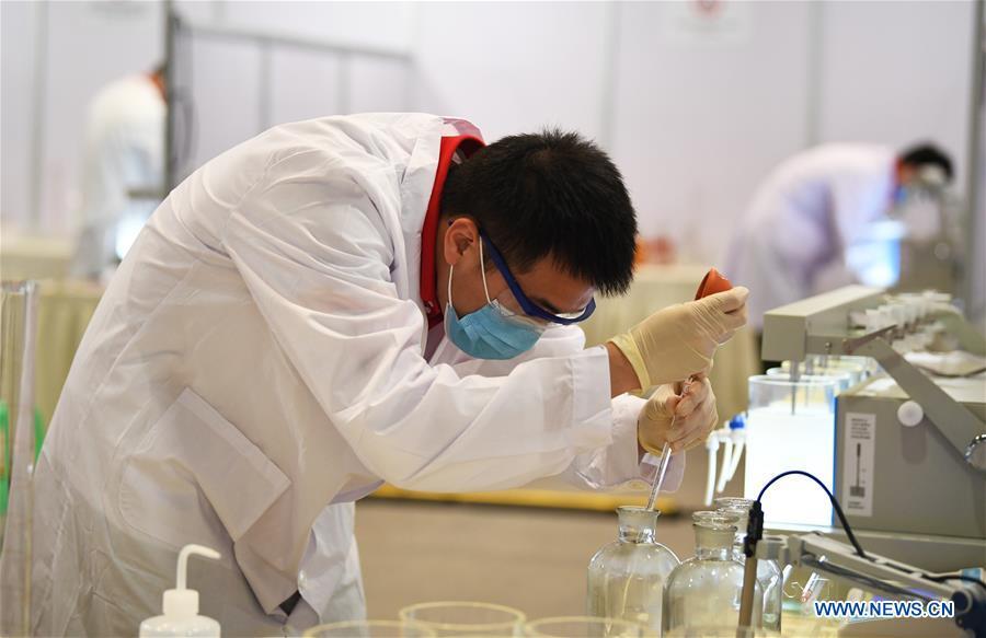 A contestant participates in the water processing competition during the Belt And Road International Skills Competition held in Chongqing International Expo Center in Chongqing, southwest China, May 29, 2019. (Xinhua/Wang Quanchao)
