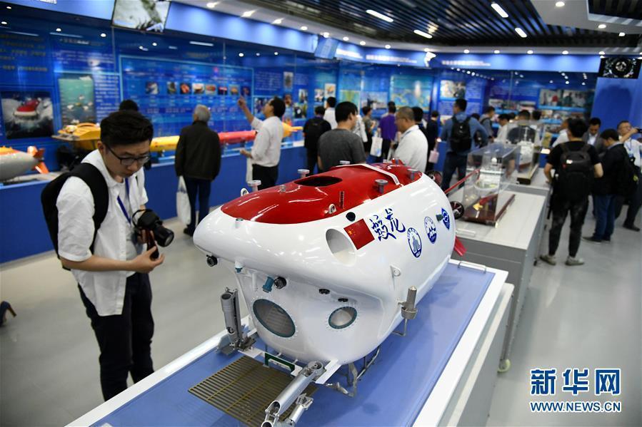 <?php echo strip_tags(addslashes(An exhibition of samples collected by China’s deep-sea exploration missions and supporting information is held at the China Ocean Sample Repository in Qingdao City, Shandong Province, May 30, 2019.  Organized by the Ministry of Natural Resources, the exhibition includes models of the research vessel Dayang Yihao, or Ocean No. 1, and the submersible Jiaolong. (Photo/Xinhua))) ?>