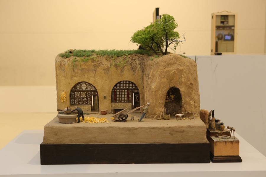 The ongoing 3CM International Trend Art exhibition at the Damei Art Center in Beijing features a number of miniature works of art, some of which can grow up to 3cm in height.  (Photos / Courtesy of Huo Huo)
