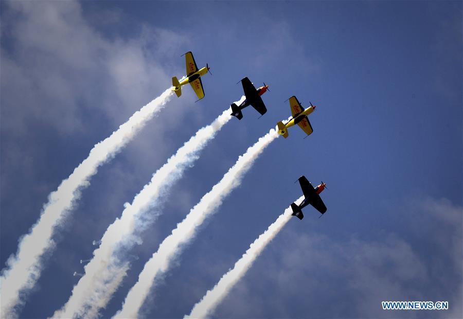 <?php echo strip_tags(addslashes(Enthusiasts in air sports give an aerobatic show during the opening of the 11th Air Sports Culture and Tourism Festival in Anyang, central China's Henan Province, June 3, 2019. The event kicked off Monday in the city of Anyang, attracting air sports fans from home and abroad. (Xinhua/Li An))) ?>