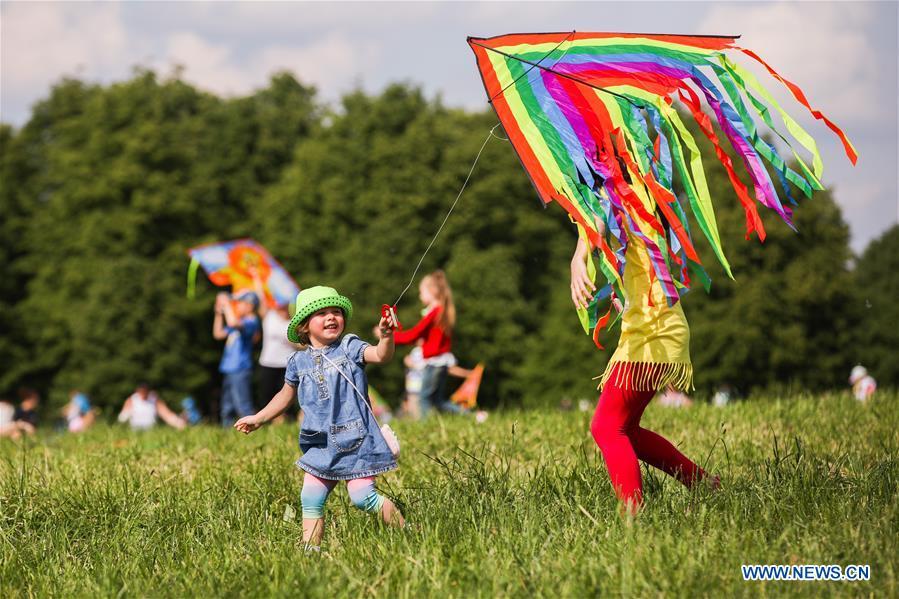 People fly kites during the Motley Sky festival in Moscow, Russia, on May 26, 2019. The Motley Sky festival was held in Moscow from May 25 to 26. (Xinhua/Maxim Chernavsky)