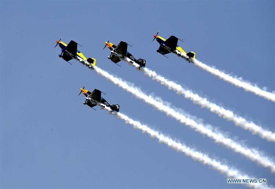 <?php echo strip_tags(addslashes(Enthusiasts in air sports give an aerobatic show during the opening of the 11th Air Sports Culture and Tourism Festival in Anyang, central China's Henan Province, June 3, 2019. The event kicked off Monday in the city of Anyang, attracting air sports fans from home and abroad. (Xinhua/Li An))) ?>