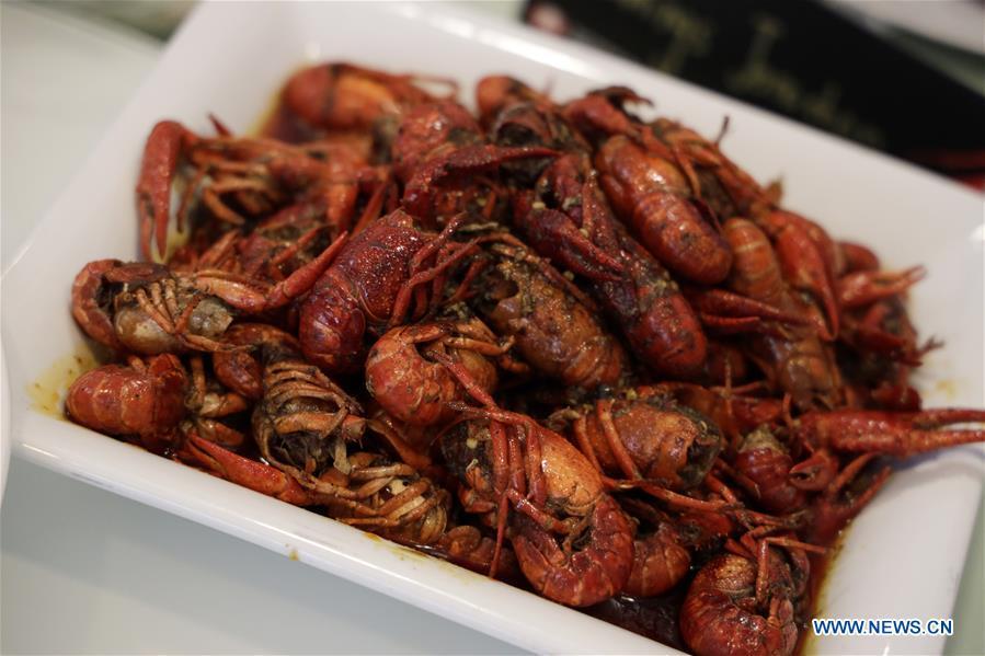 A crayfish dish is seen during the Qianjiang crayfish tasting party at the United Nations headquarters in New York, June 4, 2019. Crayfish, a rarity in Western diet but a favorite of Chinese foodies, on Tuesday made its debut at the UN Delegates Dining Room. Hosted by the city government of Qianjiang, a major producer of crayfish in central China, the tasting party was graced by officials from the UN headquarters, the World Food Programme, the UN Democracy Fund as well as UN diplomats, including representatives from the Dominican and Sri Lankan missions. (Xinhua/Li Muzi)