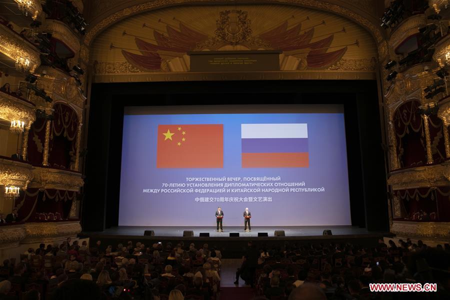 <?php echo strip_tags(addslashes(Chinese President Xi Jinping (L) and his Russian counterpart Vladimir Putin attend a gathering marking the 70th anniversary of the establishment of the China-Russia diplomatic relations at the Bolshoi Theater of Russia in Moscow June 5, 2019. (Xinhua/Yao Dawei))) ?>