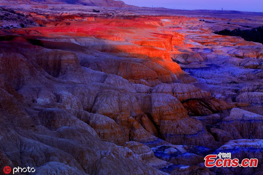 The photo taken on June 5, 2019 shows Wucaitan, also known as the Rainbow Beach in Burqin county, Altay Prefecture, northwest China\'s Xinjiang Uyghur Autonomous Region. The beach is known for its unique landforms created by years of wind and water erosion. (Photo/IC)