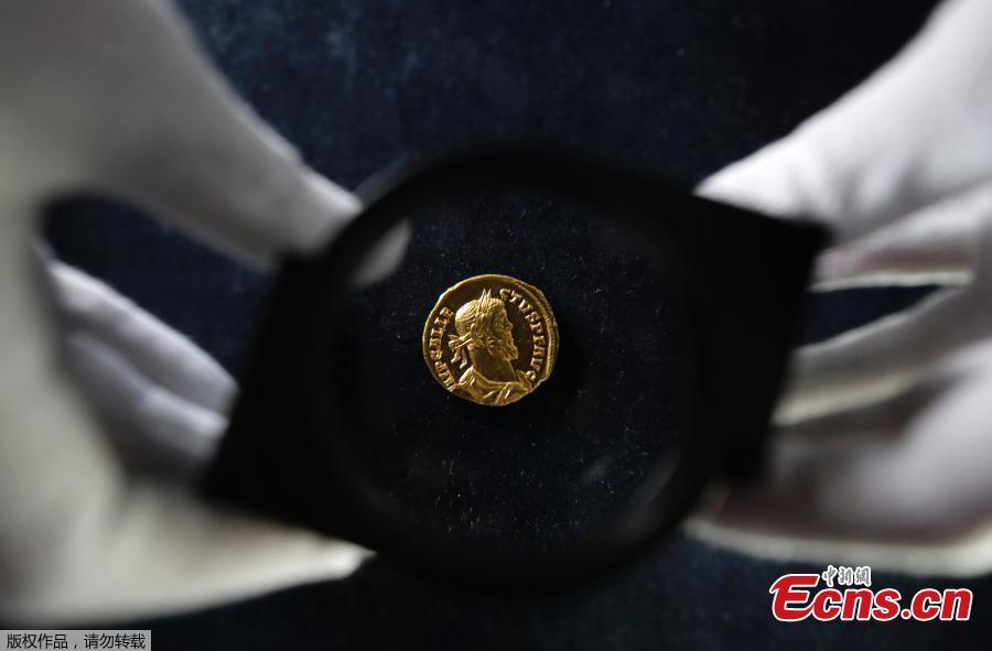 A very rare Roman gold coin dating from AD 293-296, discovered in a newly ploughed field in Kent, sold for 552,000 pounds at an auction held by Dix Noonan Webb, the Mayfair-based international coin, medal, banknote and jewellery specialists on June 6, 2019.  The coin, known as an Aureus - a gold coin of ancient Rome, is relatively small. It is 4.31grams in weight and only a bit bigger than a penny. Dating from the reign of Allectus, it was found near Dover, Kent, adjacent to a Roman road. (Photo/Agencies)