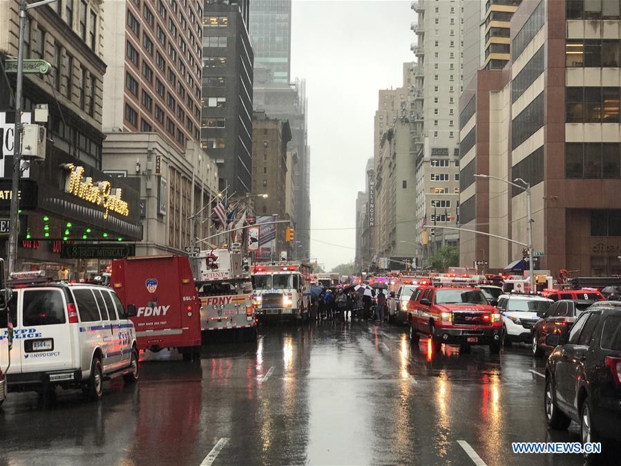 Emergency vehicles fill the street at the site of a helicopter crash in Manhattan, New York, the United States, June 10, 2019. A helicopter crashed into the roof of a skyscraper in midtown Manhattan in New York City Monday afternoon, local media reported. (Xinhua/Wang Ying)
