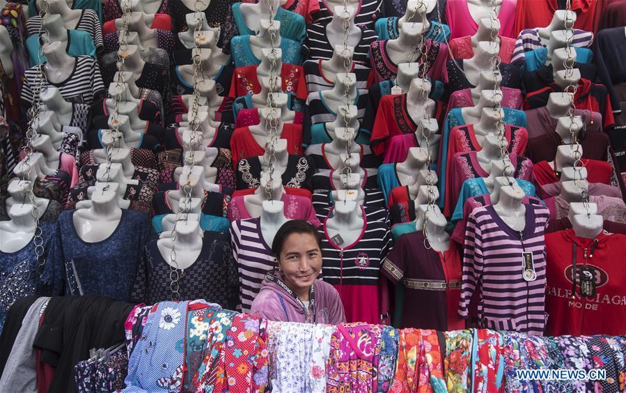 Photo taken on June 9, 2019 shows a vendor in Bishkek, capital of Kyrgyzstan. (Xinhua/Fei Maohua)