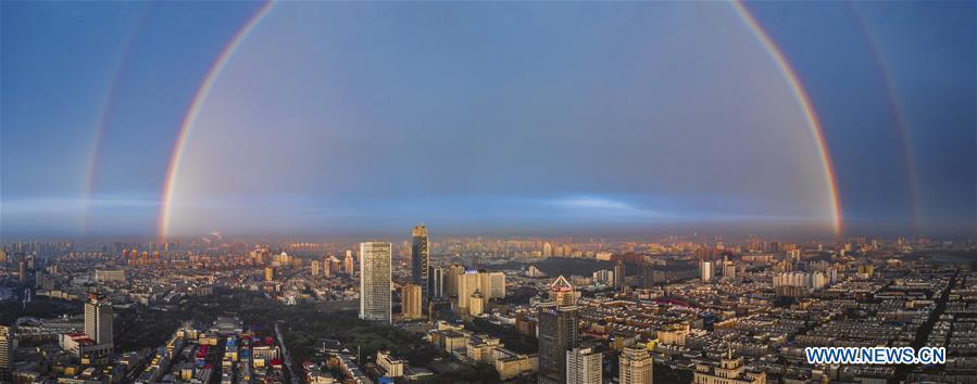 <?php echo strip_tags(addslashes(Stitched aerial photo taken on June 11, 2019 shows double rainbow arching across Changchun City, northeast China's Jilin Province. A double rainbow brightened the sky over Changchun City after a strong rainfall hit the city. (Xinhua/Xu Chang))) ?>