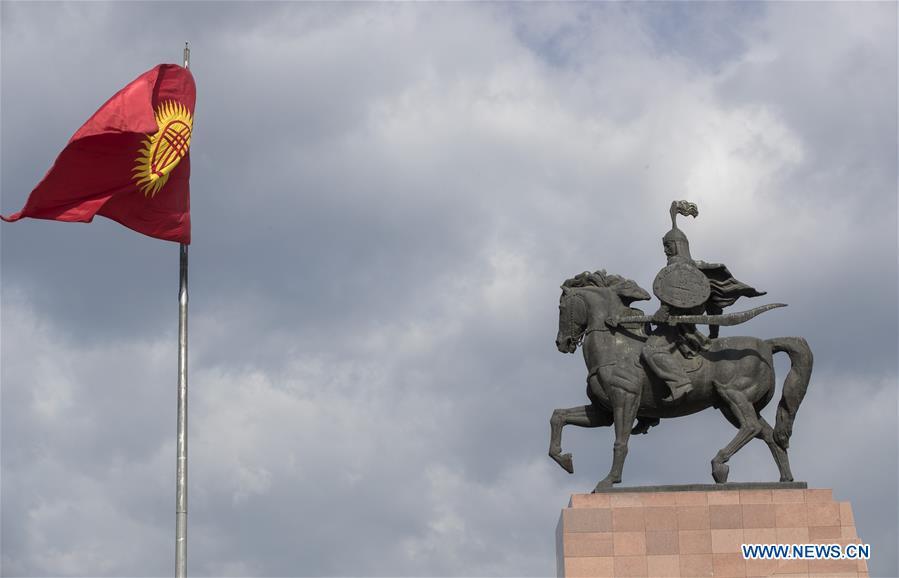 <?php echo strip_tags(addslashes(Photo taken on June 9, 2019 shows Kyrgyzstan's national flag and the Manas statue at the Ala-Too Square in Bishkek, capital of Kyrgyzstan. (Xinhua/Fei Maohua))) ?>