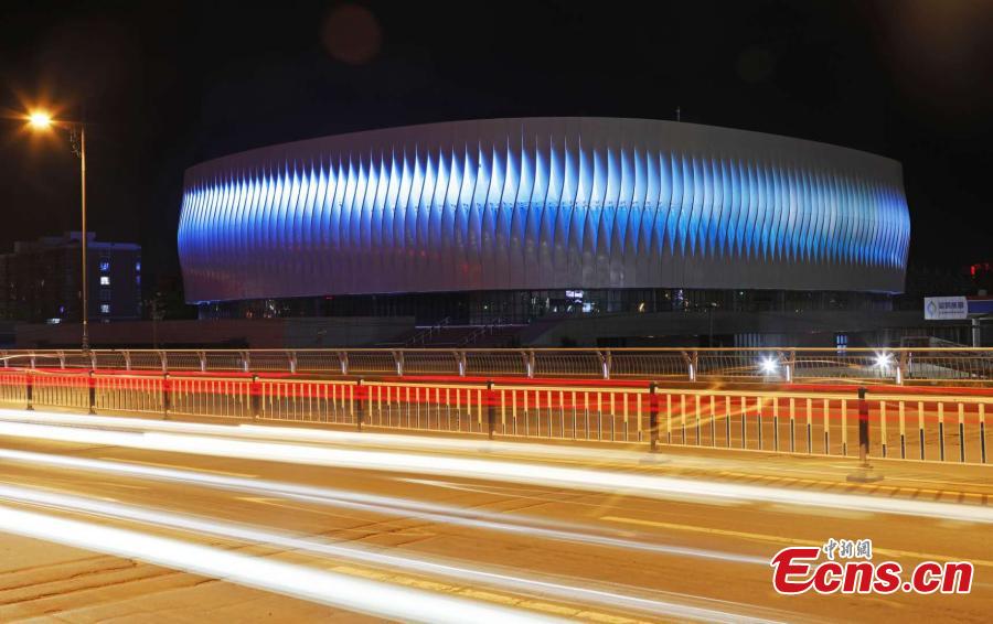 <?php echo strip_tags(addslashes(The illuminated gymnasium newly built at Hebei North University in Zhangjiakou City, North China’s Hebei Province. With a total investment of 261 million yuan ($37.8 million), the building has a floor area of 26,300 square meters and is the first dome structure gymnasium in Hebei. It can be used to host international and national competitions for many ice-based events, such as ice hockey, short-track speed skating and figure skating. (Photo: China News Service/Wu Diansen))) ?>