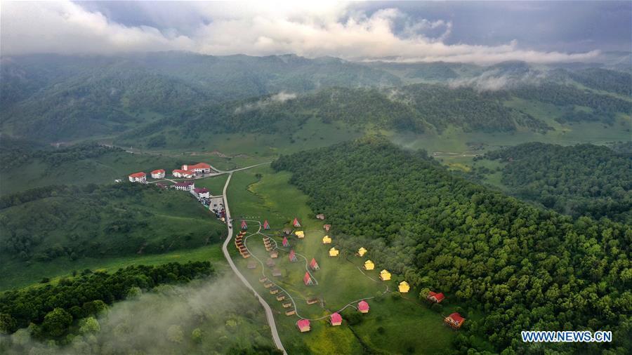 Aerial photo taken on June 12, 2019 shows a RV camp hotel on Guanshan Grassland at Longxian County in Baoji, northwest China\'s Shaanxi Province. (Xinhua/Tao Ming)