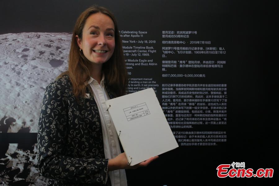 The Apollo 11 Lunar Module Timeline Book, which will be up for auction on July 18 at Christie\'s in New York, fifty years after the historic space mission in 1969, is photographed in Beijing, June 13, 2019. The book, estimated to be worth $7-9 million, was a key component of achieving the goal of placing man on the moon and returning him safely to earth. The Timeline Book will be the star lot offered within the auction, One Giant Leap: Celebrating Space Exploration 50 Years after Apollo 11, which will include more than 150 lots of space history artefacts. (Photo: China News Service/Yang Kejia)