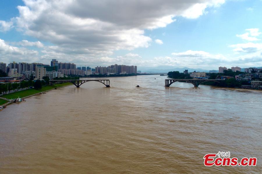 Photo taken on June 14, 2019 shows the collapsed Zijin Bridge in Yuancheng District, Heyuan City, Guangdong Province. Two vehicles plunged to the water when the bridge fell at around 2 am on Friday, with one person rescued. Search and rescue efforts are still underway and the cause of the collapse is under investigation.  (Photo provided by the Publicity Department of the CPC Heyuan Committee)