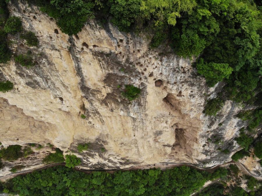 <?php echo strip_tags(addslashes(An aerial photo taken on June 11 shows the canal carved into cliffs in Gaoliu village, Southwest China's Guizhou Province. (Photo by Han Xianpu/For chinadaily.com.cn))) ?>