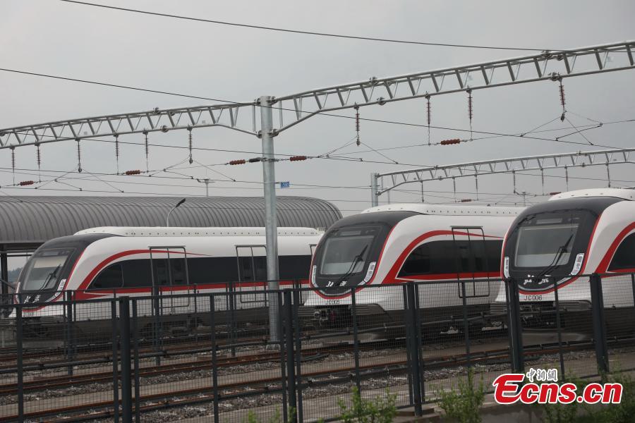A train runs on a new airport subway line for trial in Beijing, capital of China, June 15, 2019. Self-driving trains for the subway line connecting downtown Beijing with its new international airport started trial run Saturday, according to local authorities. Stretching 41.4 kilometers, the new line supports autopilot system and can run at a speed of 160 km per hour, with as many as 448 passengers, according to Beijing Major Projects Construction Headquarters Office. (Photo/VCG)