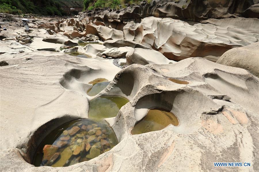 Photo taken on June 16, 2019 shows a pothole landscape along the Shenyu River valley in Huoshi Village of Tieliu Township, Huidong County, southwest China\'s Sichuan Province. (Xinhua/Jiang Hongjing)