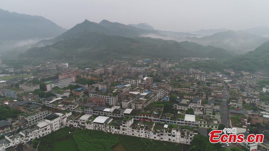 <?php echo strip_tags(addslashes(An aerial view of Shuanghe Town, at the epicentre of a 6.0-magnitude earthquake, in Yibin City, Southwest China’s Sichuan Province, June 18, 2019. Eleven people died and another 122 were reported injured after the earthquake on Monday night, according to local authorities. (Photo: China News Service/Liu Zhongjun))) ?>