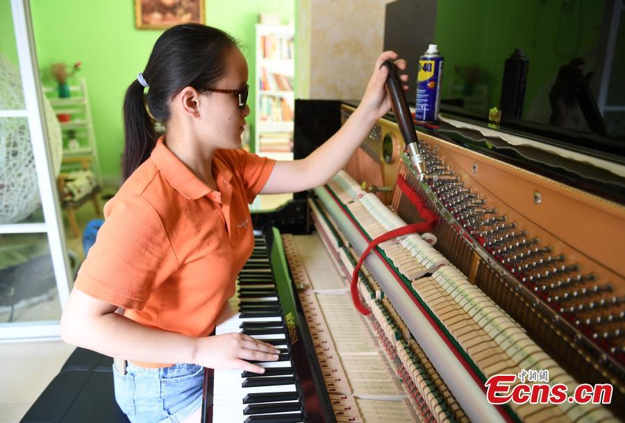 Blind woman turns piano tuner