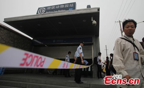 The accident site, a Beijing subway stop, was sealed off. 