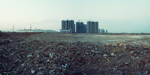 A photography series named Rubbish-besieged City by Wang Jiuliang.
