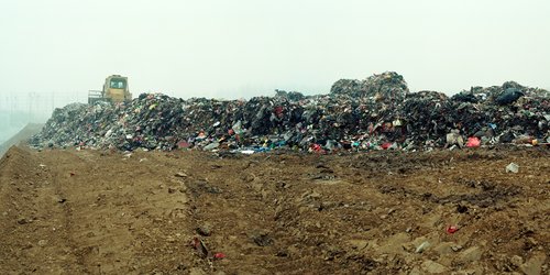 A photography series named Rubbish-besieged City by Wang Jiuliang.