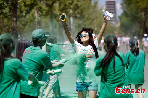June 20, Beijing, 2015 The Color Run event starts at Garden Expo park, over 20 thousand people joined. (CNS photo/ Sheng Jiapeng)