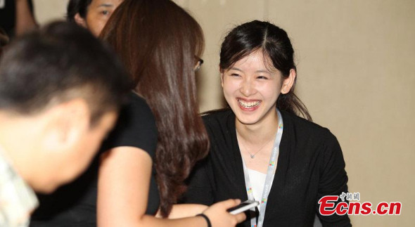 Web celebrity Zhang Zetian, known online as 'Milk Tea Sister', attends a promotional event organized by Microsoft as its intern product manager on May 29, 2014. (Photo/CFP)