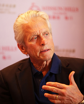 Oscar winner Michael Douglas speaks during a press conference in Haikou,Hainan province, on Friday. (Photo by Qiu Quanlin/chinadaily.com.cn)