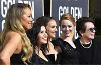 'Power of women' dominates at black-draped Golden Globes