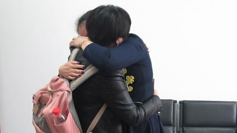 Twin sisters find each other after 36 years with police officer's help