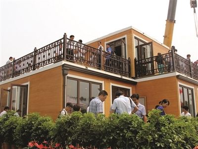 A two-storied villa has been built in just three hours in Xi'an, the capital of Shaanxi province, thanks to three-dimensional (3D) printing technology. (Photo/Jiangnan Times) 