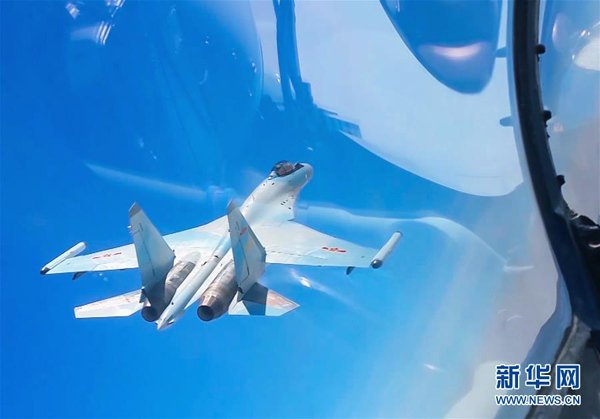 Chinese air force conducts high-sea training