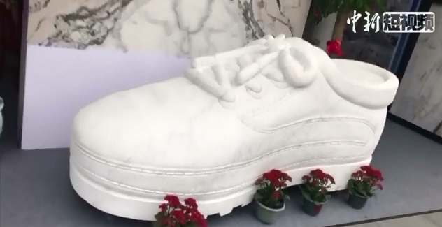 Giant shoe on display at Xiamen Stone Expo