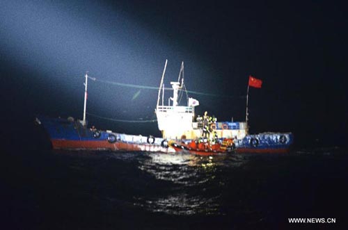 Coastguards of the Republic of Korea (ROK) board the Chinese fishing vessel, April 30, 2012. The Department of Consular Affairs of the Chinese Ministry of Foreign Affairs said it is verifying the conflict reported to take place in the Yellow Sea between a