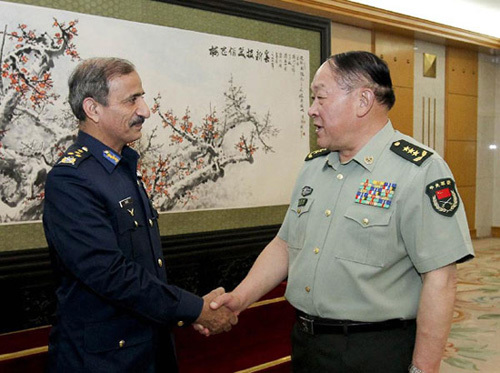 Chinese State Councilor and Defense Minister Liang Guanglie (R) meets with Pakistani Chief of Air Staff Marshal Tahir Rafique Butt in Beijing, capital of China, June 4, 2012. (Xinhua/Ding Lin)