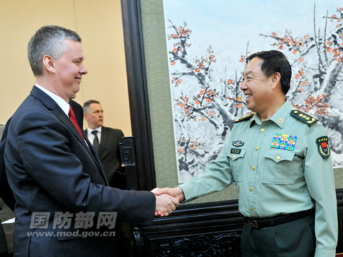 Fan Changlong, vice chairman of the Central Military Commission, meets with Tomasz Siemoniak, the visiting minister of national defense of Poland, on the morning of May 24, 2013 in Beijing. (Photo by Li Xiaowei)