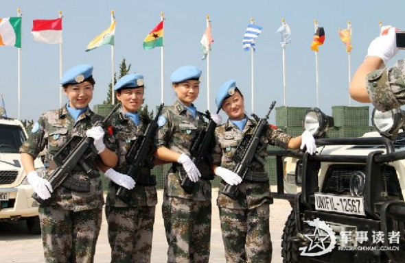 The female members of the 10th Chinese peacekeeping medical detachment to Lebanon pose for a group photo. Recently, 60 peacekeeping officers and men of the 10th Chinese peacekeeping medical detachment to Lebanon were awarded the United Nations Medals of Peace. (Chinamil.com.cn/ Yang Shengchao and Wang Qiang)