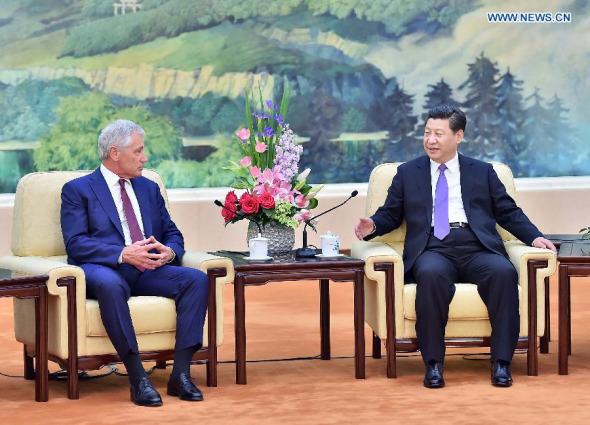 Chinese President Xi Jinping (R) meets with visiting US Defence Secretary Chuck Hagel in Beijing, capital of China, April 9, 2014. (Xinhua/Li Tao)