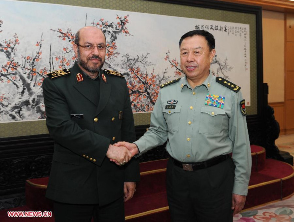 Vice Chairman of China's Central Military Commission Fan Changlong (R) meets with Iranian Minister of Defense and Armed Forces Logistics Hossein Dehqan in Beijing, capital of China, May 7, 2014. (Xinhua/Rao Aimin)