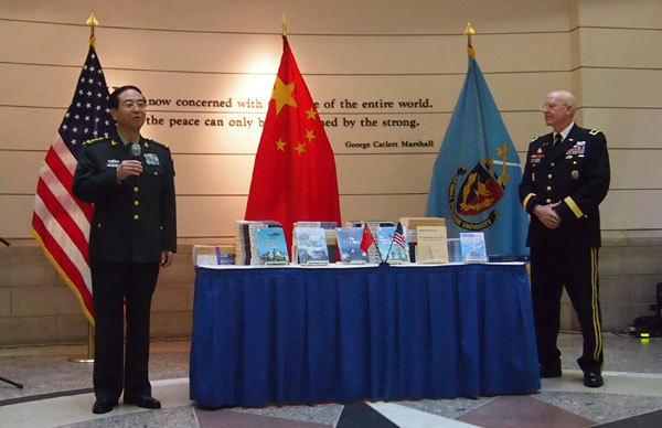 General Fang Fenghui, chief of the General Staff of China's People's Liberation Army, speaks at a book exchange ceremony at the US National Defense University in Washington on Wednesday. At right is NDU President Major General Gregg Martin. Chen Weihua / China Daily
